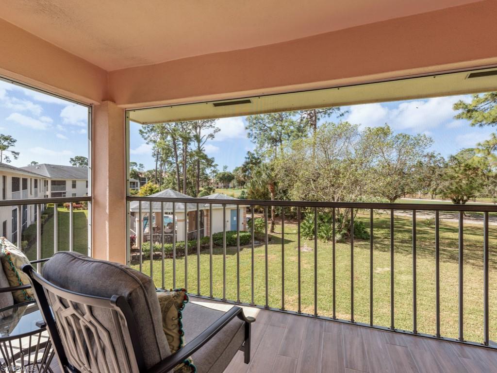 709 Augusta Boulevard, Unit 7095 Naples, FL 34113 - Photo 13 of 16 a view of balcony with furniture