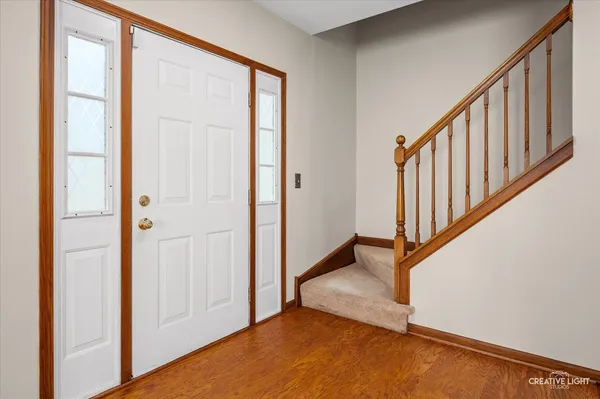 a view of an entryway with staircase