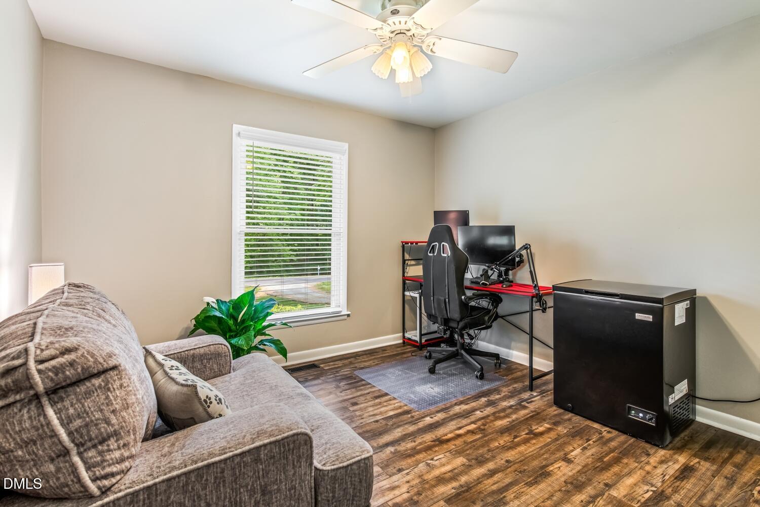 134 Longview Road Madison, NC 27025 - Photo 36 of 49 a view of a workspace with furniture and a window