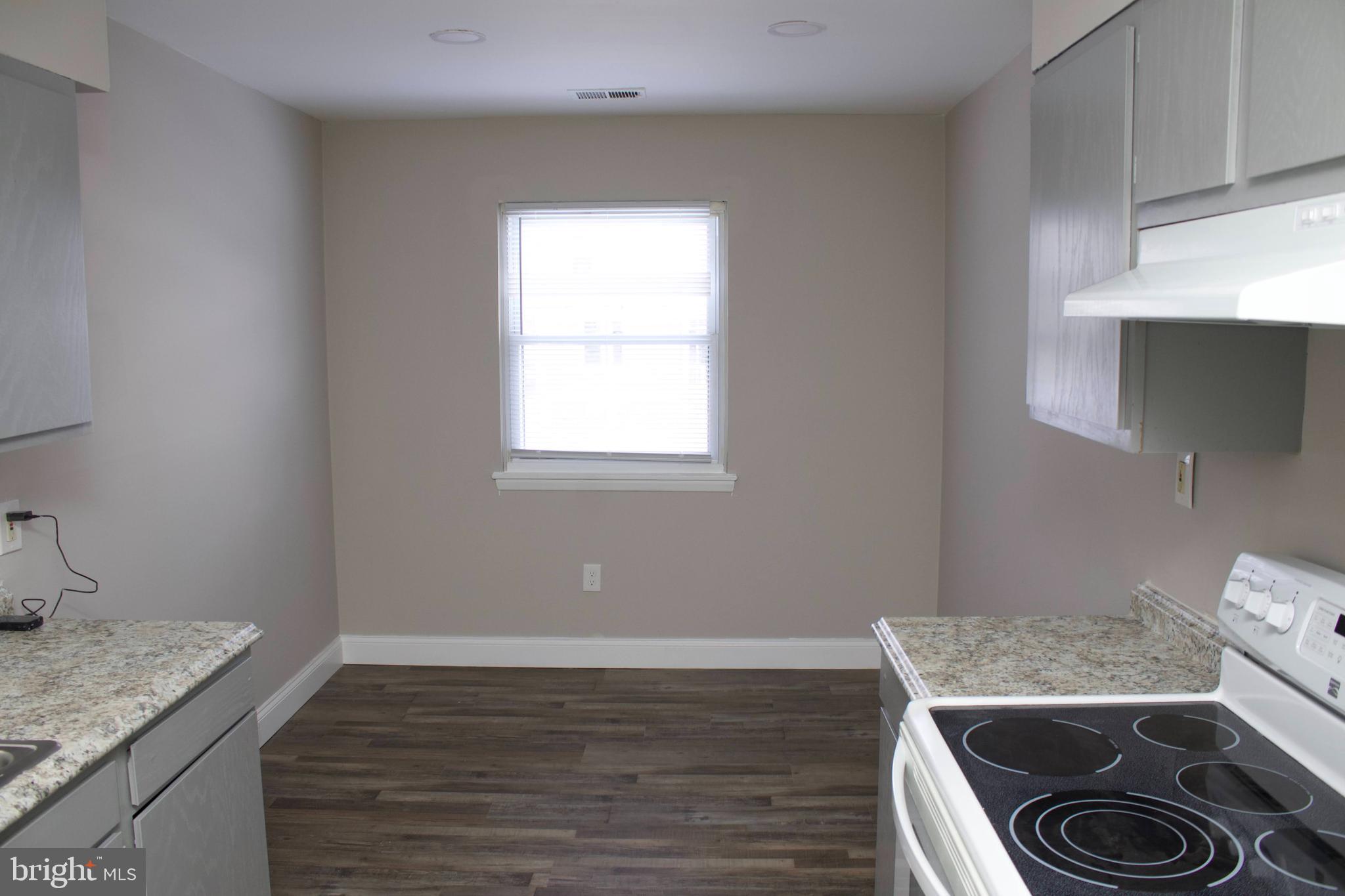 4209 Ridgewood Avenue, Unit 1 Baltimore, MD 21215 - Photo 5 of 9 kitchen with dining area