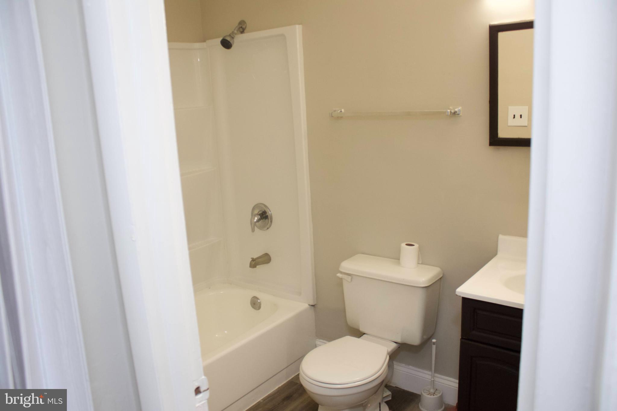 4209 Ridgewood Avenue, Unit 1 Baltimore, MD 21215 - Photo 6 of 9 Updated Bathroom
