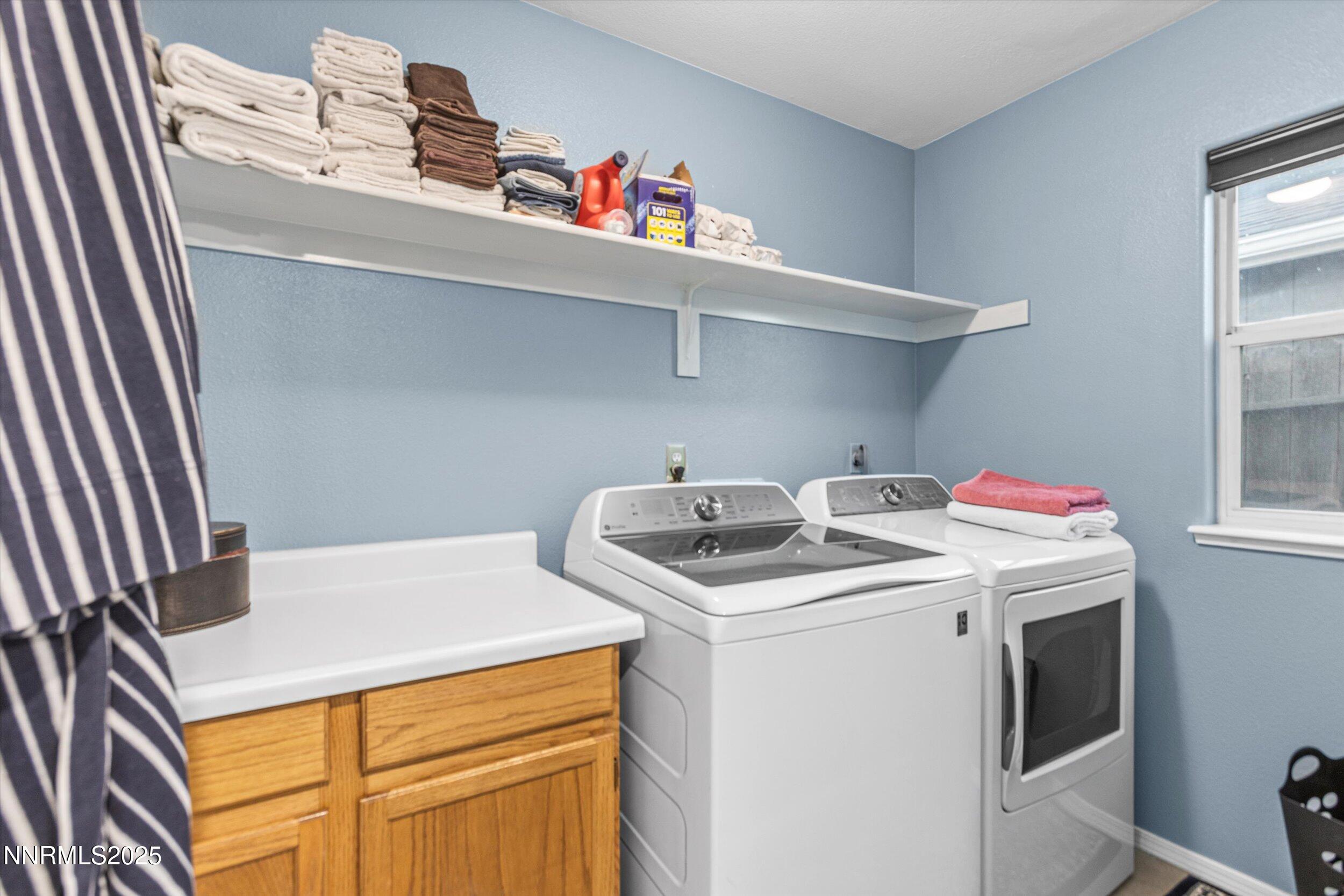 3131 Winter Rose Circle Reno, NV 89502 - Photo 14 of 32 a utility room with dryer and washer
