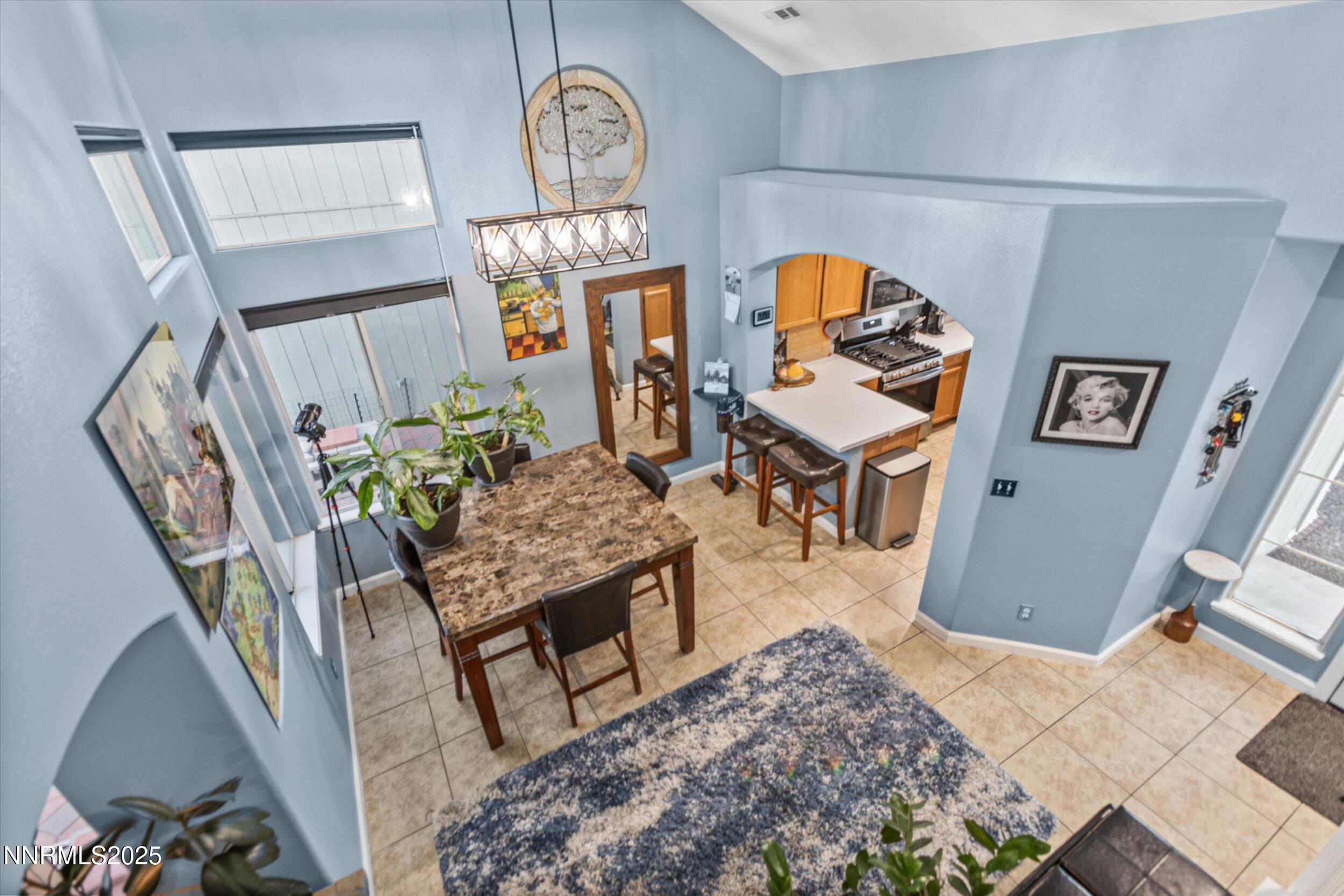 3131 Winter Rose Circle Reno, NV 89502 - Photo 4 of 32 a living room with furniture and wooden floor