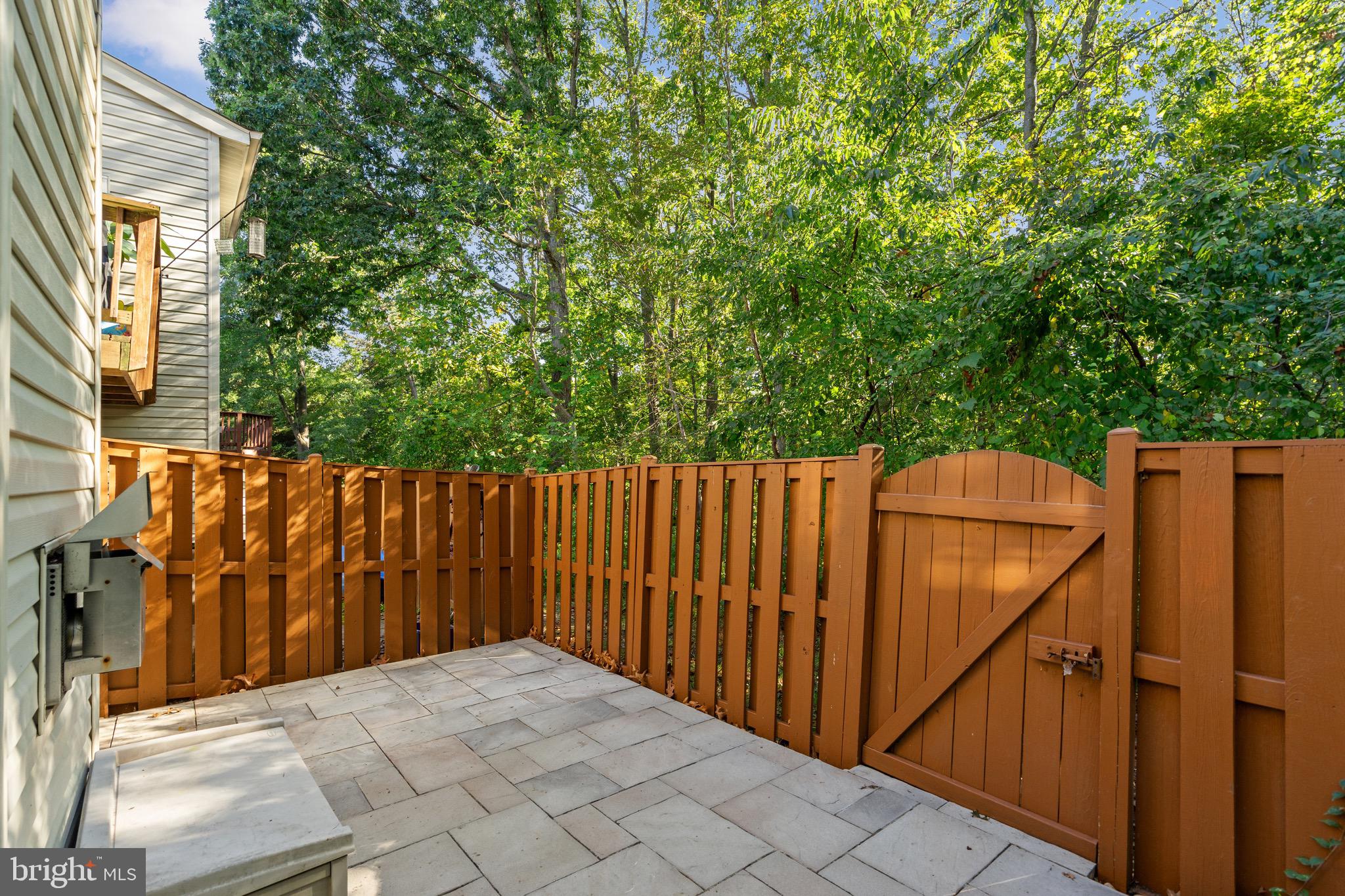 7728 Effingham Square Alexandria, VA 22315 - Photo 28 of 34 Rear patio with enclosed fence