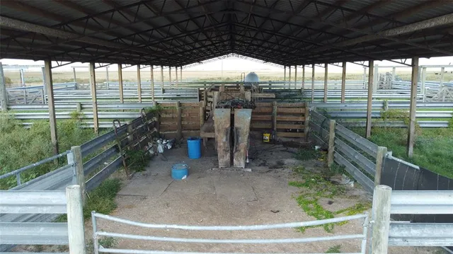 an aerial view of a houses with outdoor space