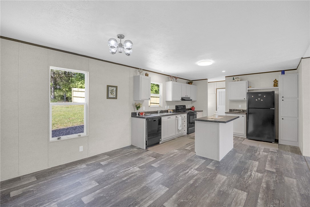 375 Griggs Road Six Mile, SC 29682 - Photo 13 of 36 Bright, open-concept kitchen and living area with ample natural light.