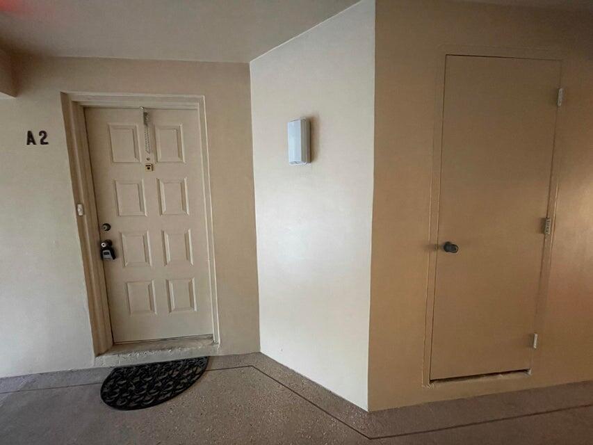 610 Sea Pine Way, Unit A2 Greenacres, FL 33415 - Photo 2 of 13 a view of front door