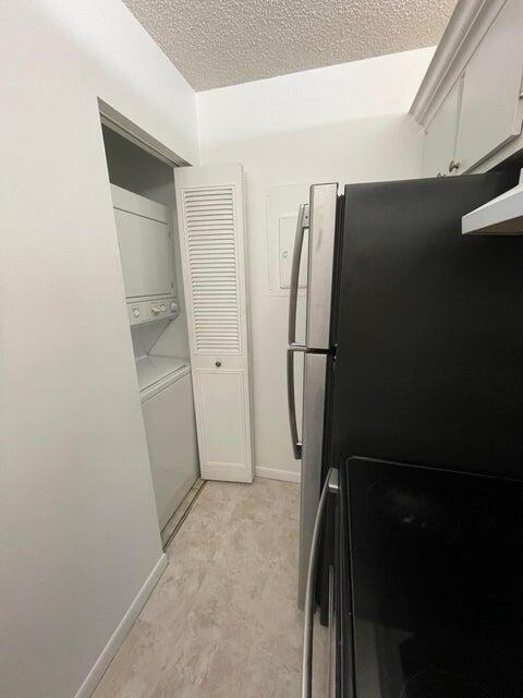 610 Sea Pine Way, Unit A2 Greenacres, FL 33415 - Photo 4 of 13 a view of closet