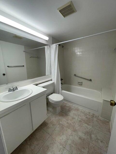 610 Sea Pine Way, Unit A2 Greenacres, FL 33415 - Photo 8 of 13 a bathroom with a bathtub and a sink