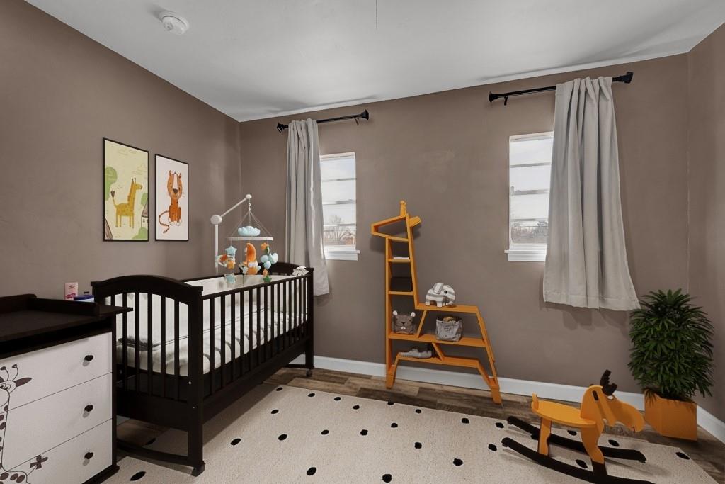 6117 Gainsborough Road Amarillo, TX 79106 - Photo 32 of 40 a bedroom with furniture and window