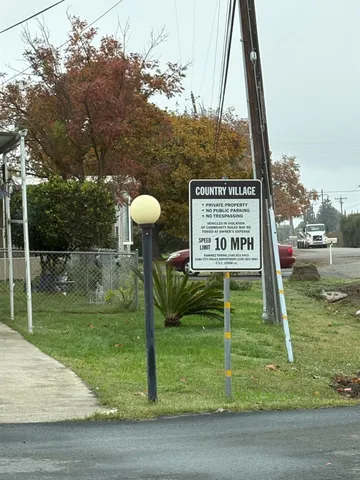 a sign on the side of the road