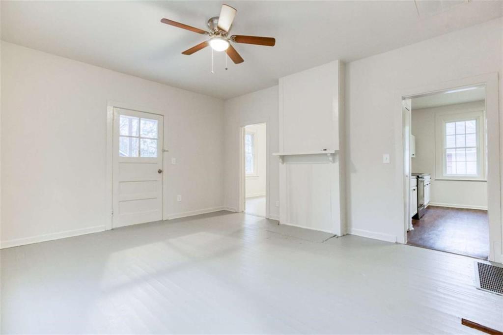126 6th Street Monroe, GA 30655 - Photo 11 of 24 an empty room with closet and windows