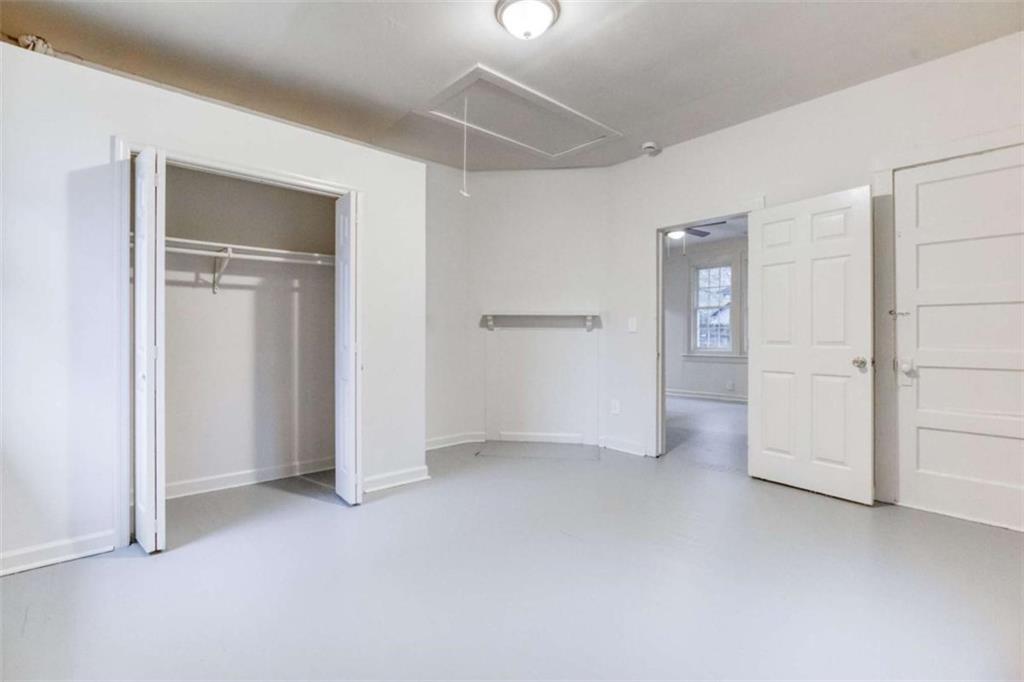 126 6th Street Monroe, GA 30655 - Photo 19 of 24 an empty room with closet area