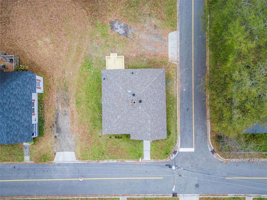 126 6th Street Monroe, GA 30655 - Photo 5 of 24 front view of a house with a garden