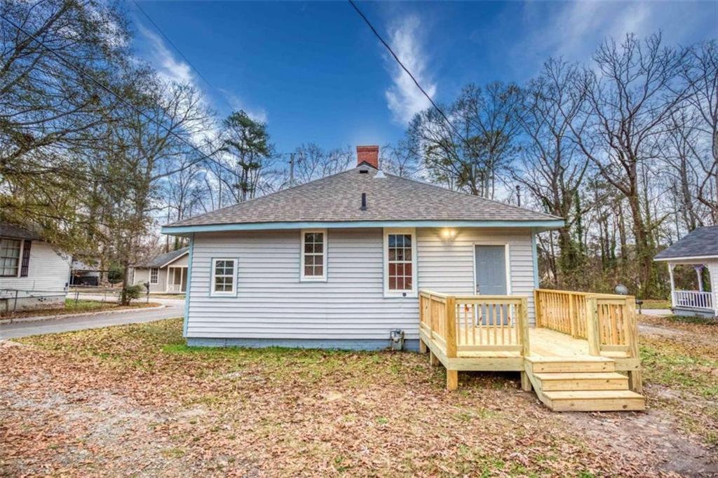 126 6th Street Monroe, GA 30655 - Photo 7 of 24 a view of a house with a yard and outdoor space