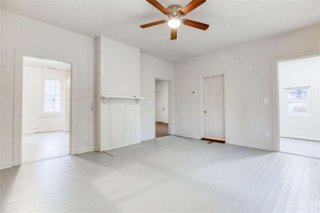 126 6th Street Monroe, GA 30655 - Photo 10 of 24 a view of an empty room with a window