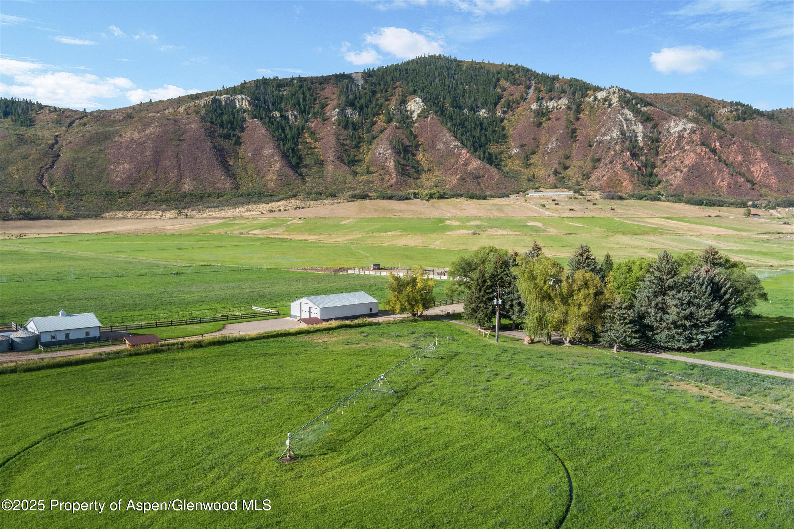 2700 Emma Road Basalt, CO 81621 - Photo 8 of 36 a view of a grassy area with an ocean