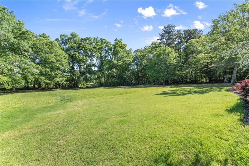 5822 John Burruss Road Cumming, GA 30040 - Photo 46 of 65 a view of a tennis court