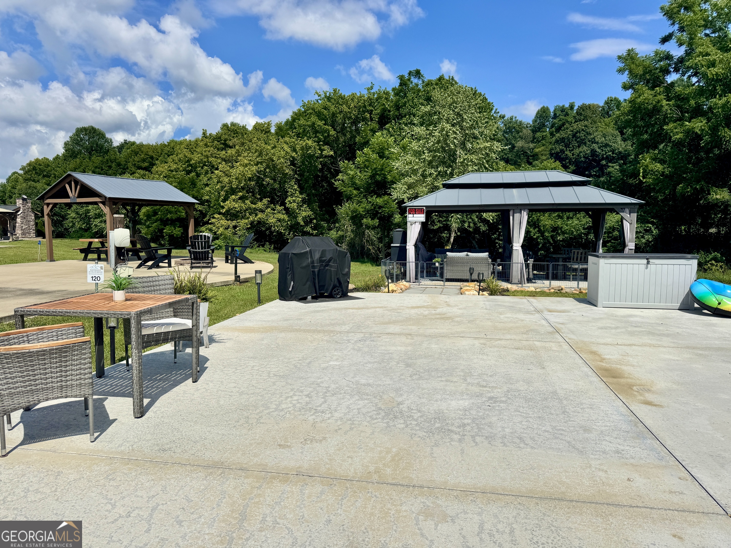 a view of a swimming pool with a patio