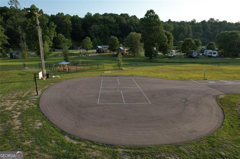 121 Mountain Meadows Morganton, GA 30560 - Photo 22 of 28 a view of a playground with basketball court