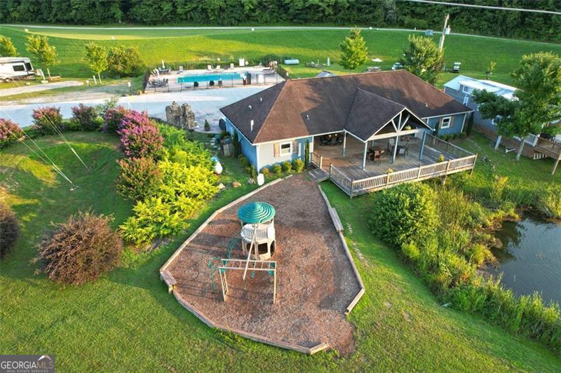 121 Mountain Meadows Morganton, GA 30560 - Photo 24 of 28 an aerial view of a house with big yard