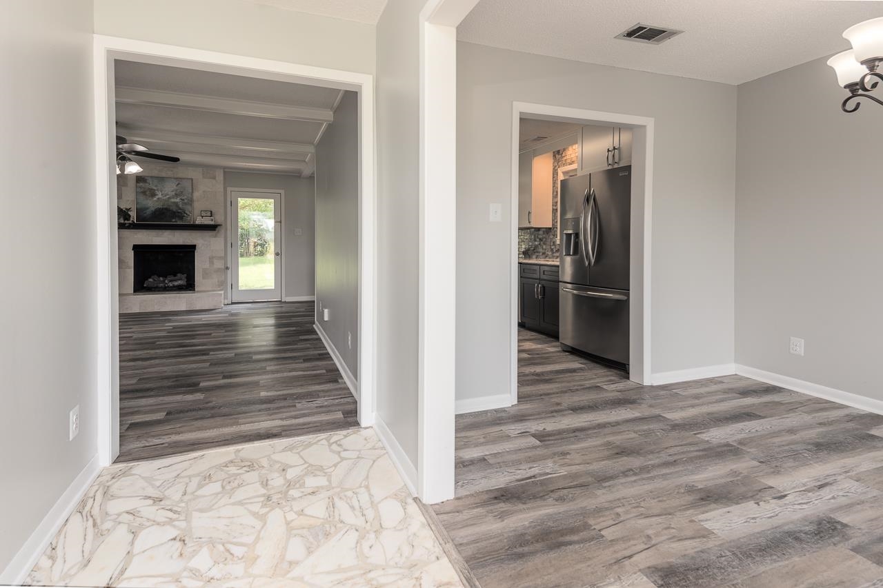 3620 Oak Road Bartlett, TN 38135 - Photo 3 of 28 Charming tile hall opens to great room w/ beamed ceiling and dining room