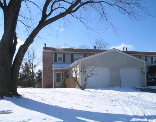 113 Julie Road, Unit 113 Bolingbrook, IL 60440 - Photo 1 of 1 a view of a house with a snow