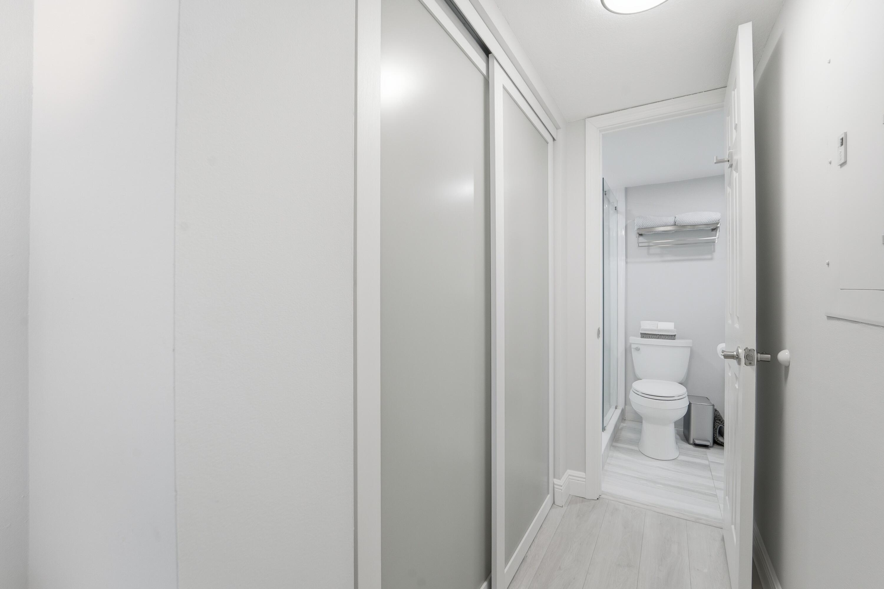 1605 Highway 1, Unit 303M1 Jupiter, FL 33477 - Photo 23 of 42 a bathroom with a toilet