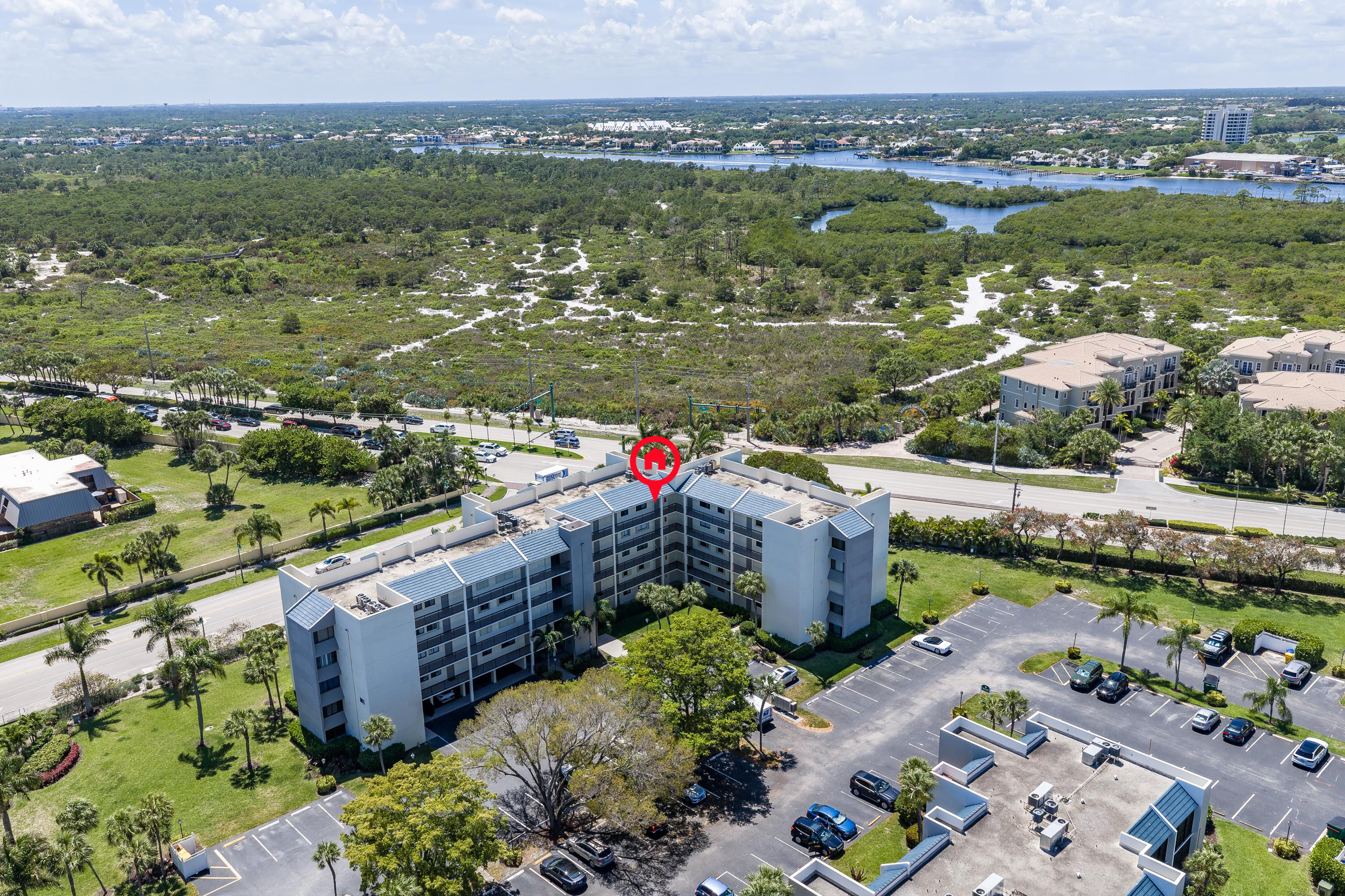 1605 Highway 1, Unit 303M1 Jupiter, FL 33477 - Photo 38 of 42 a view of a city with mountains in the background