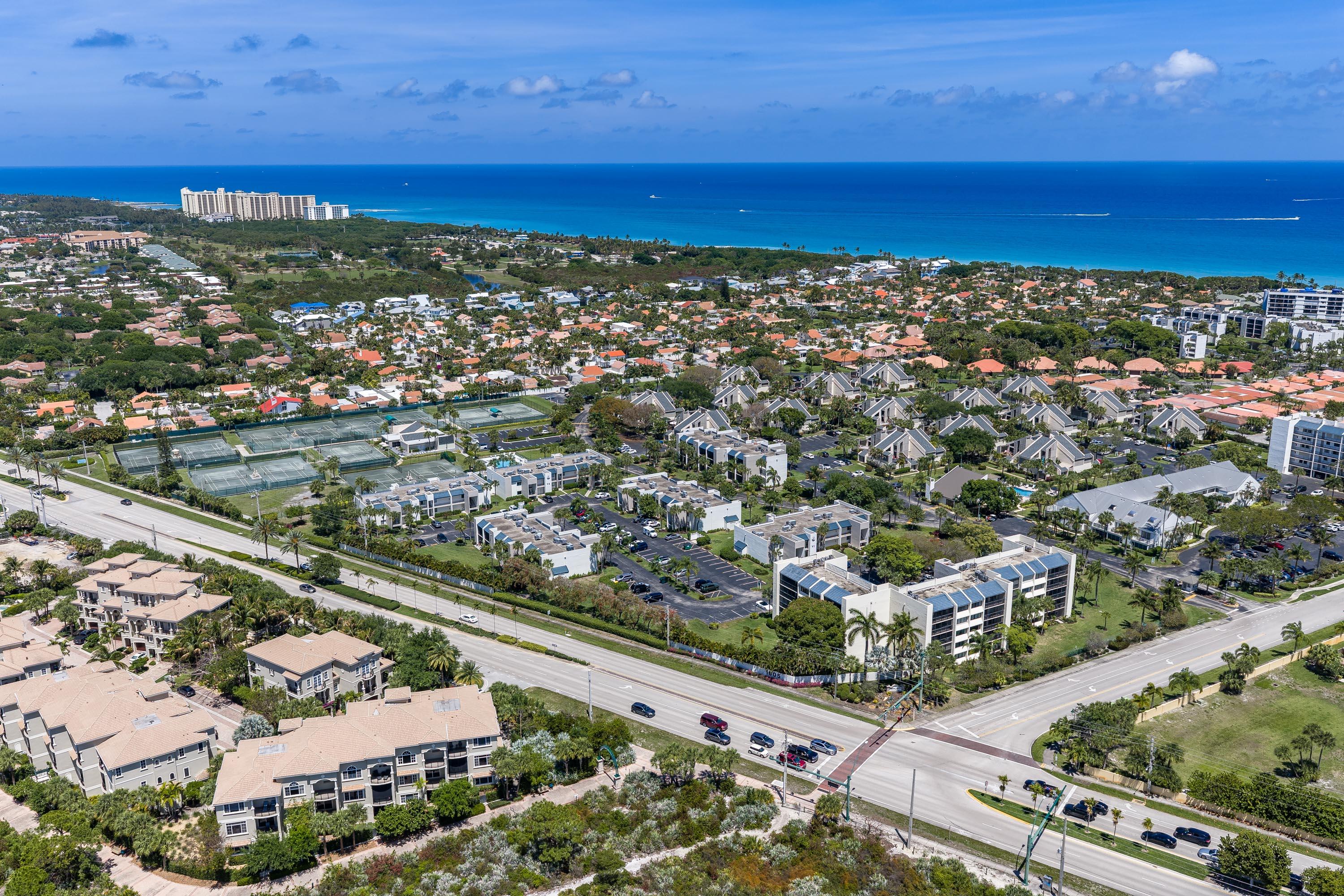 1605 Highway 1, Unit 303M1 Jupiter, FL 33477 - Photo 40 of 42 an aerial view of residential building and ocean view