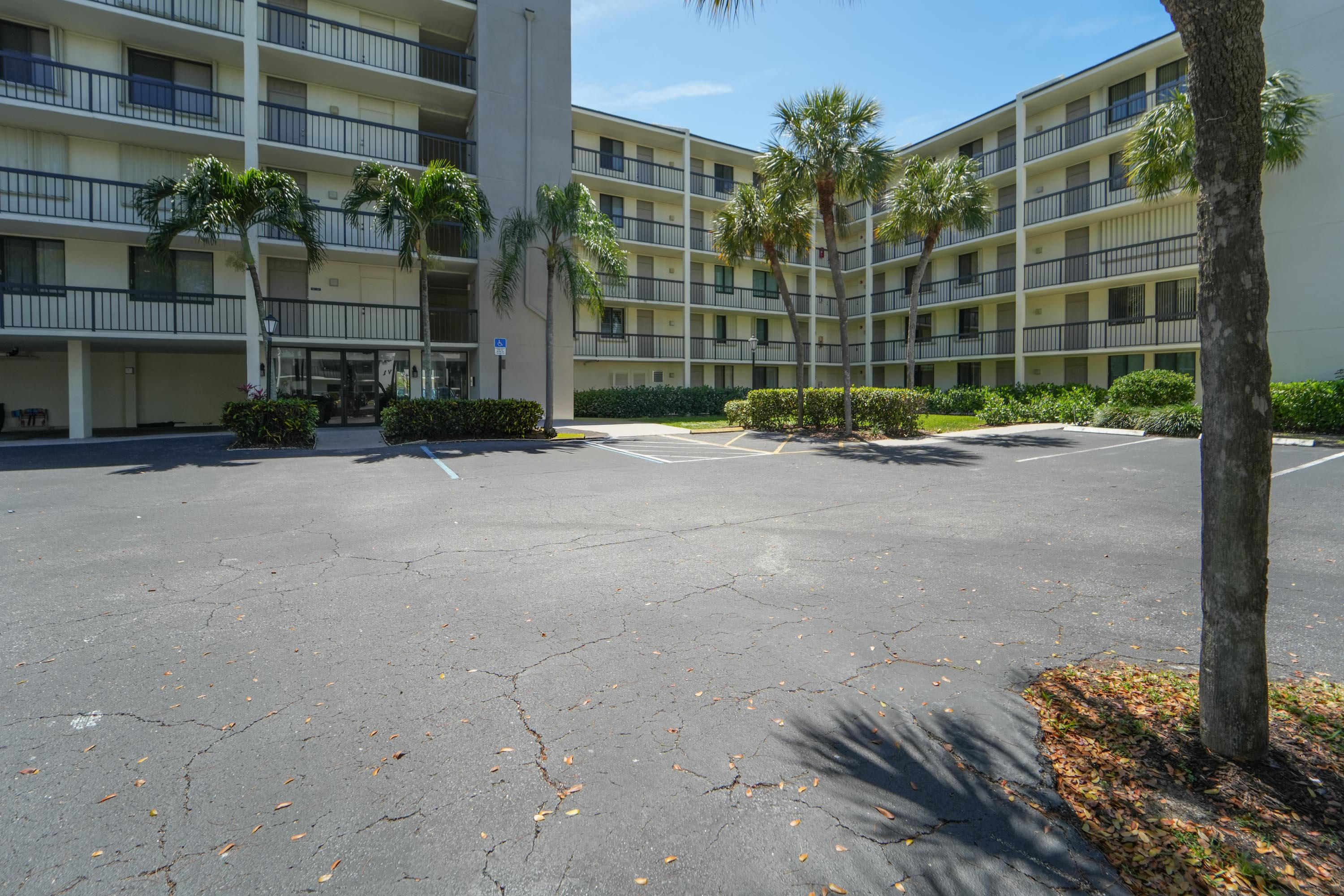 1605 Highway 1, Unit 303M1 Jupiter, FL 33477 - Photo 4 of 42 a view of a building with a street