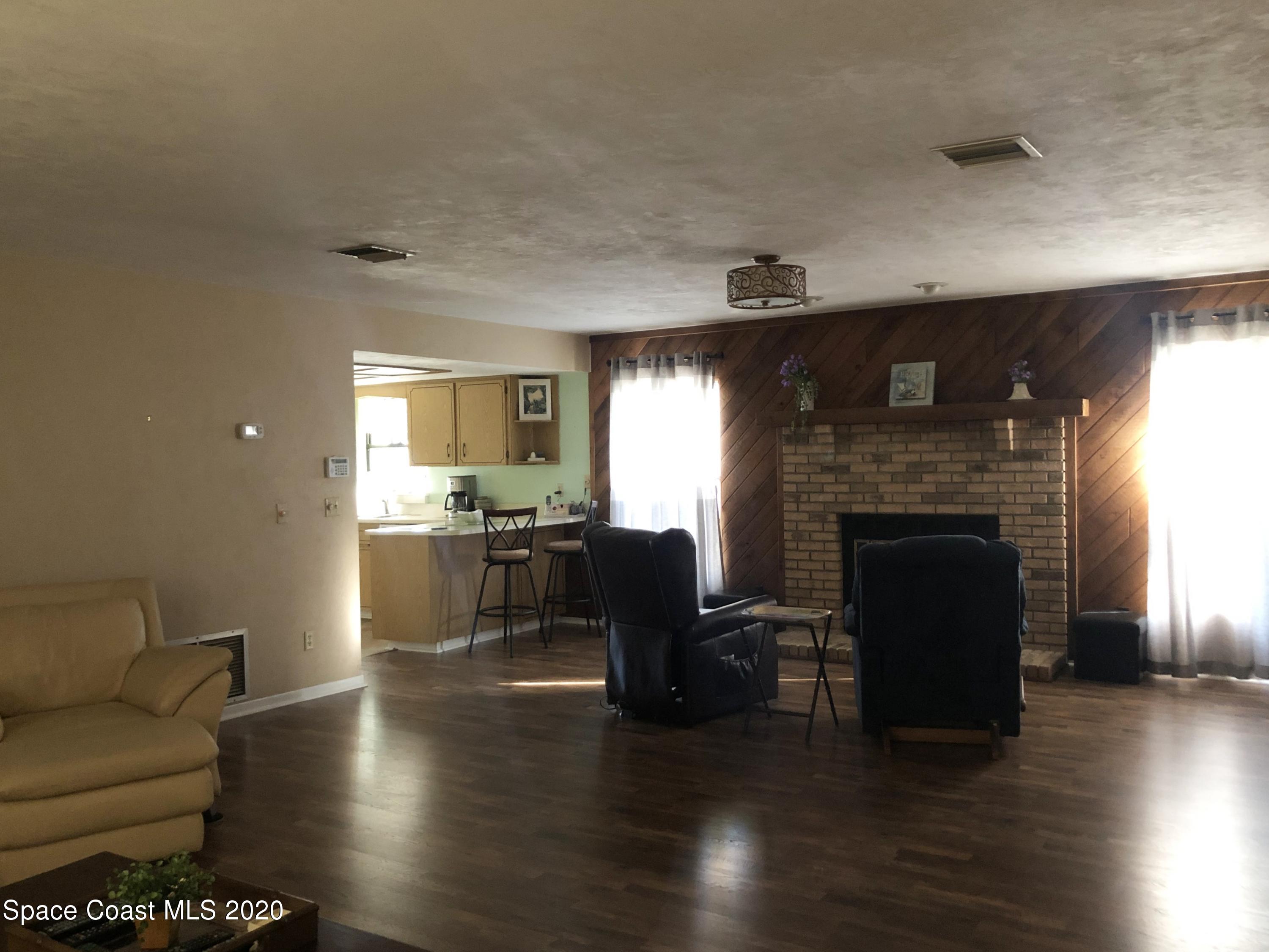 3627 Canal Road Edgewater, FL 32141 - Photo 12 of 33 13- toward fireplace