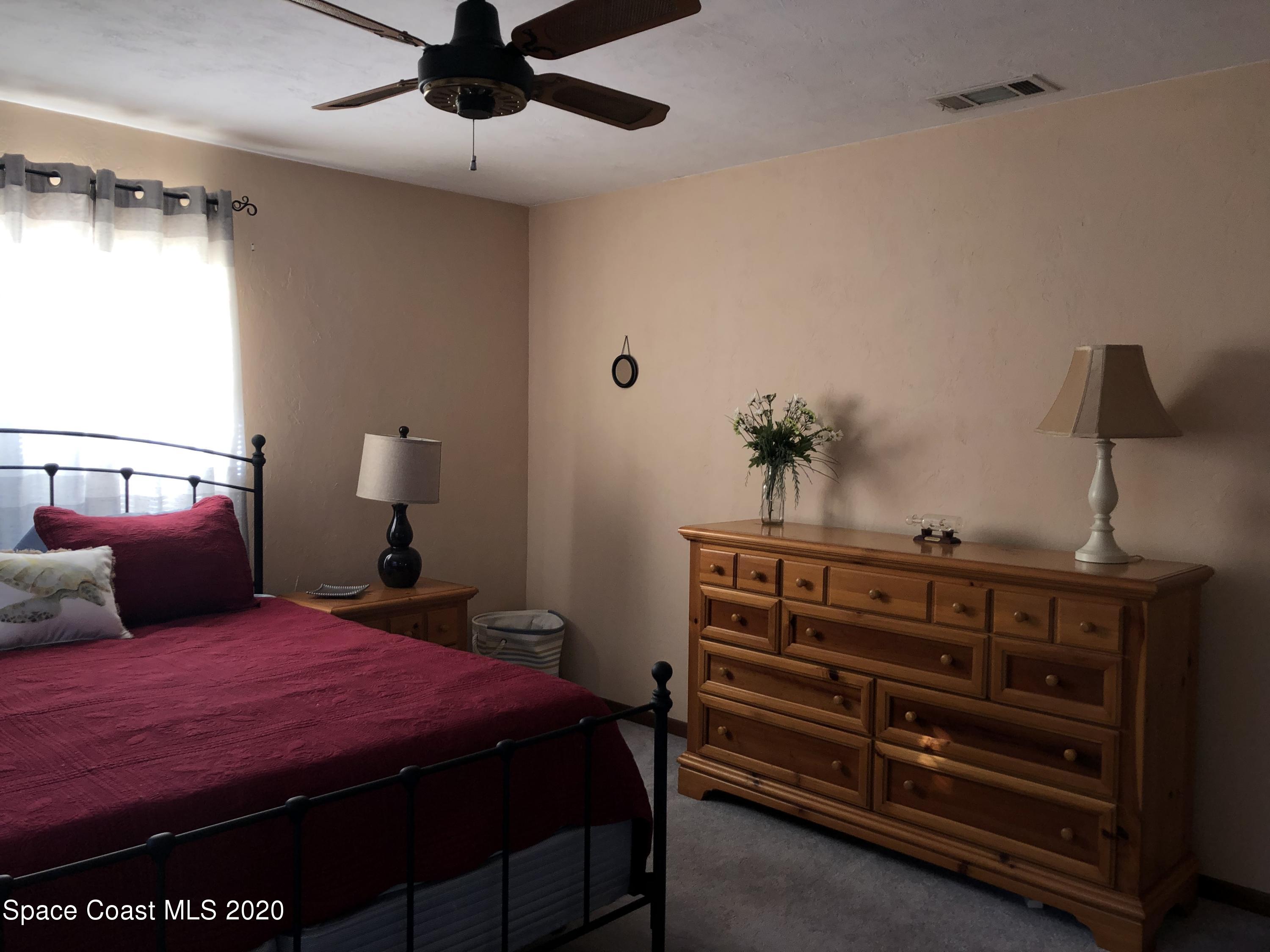 3627 Canal Road Edgewater, FL 32141 - Photo 20 of 33 22-Master bed