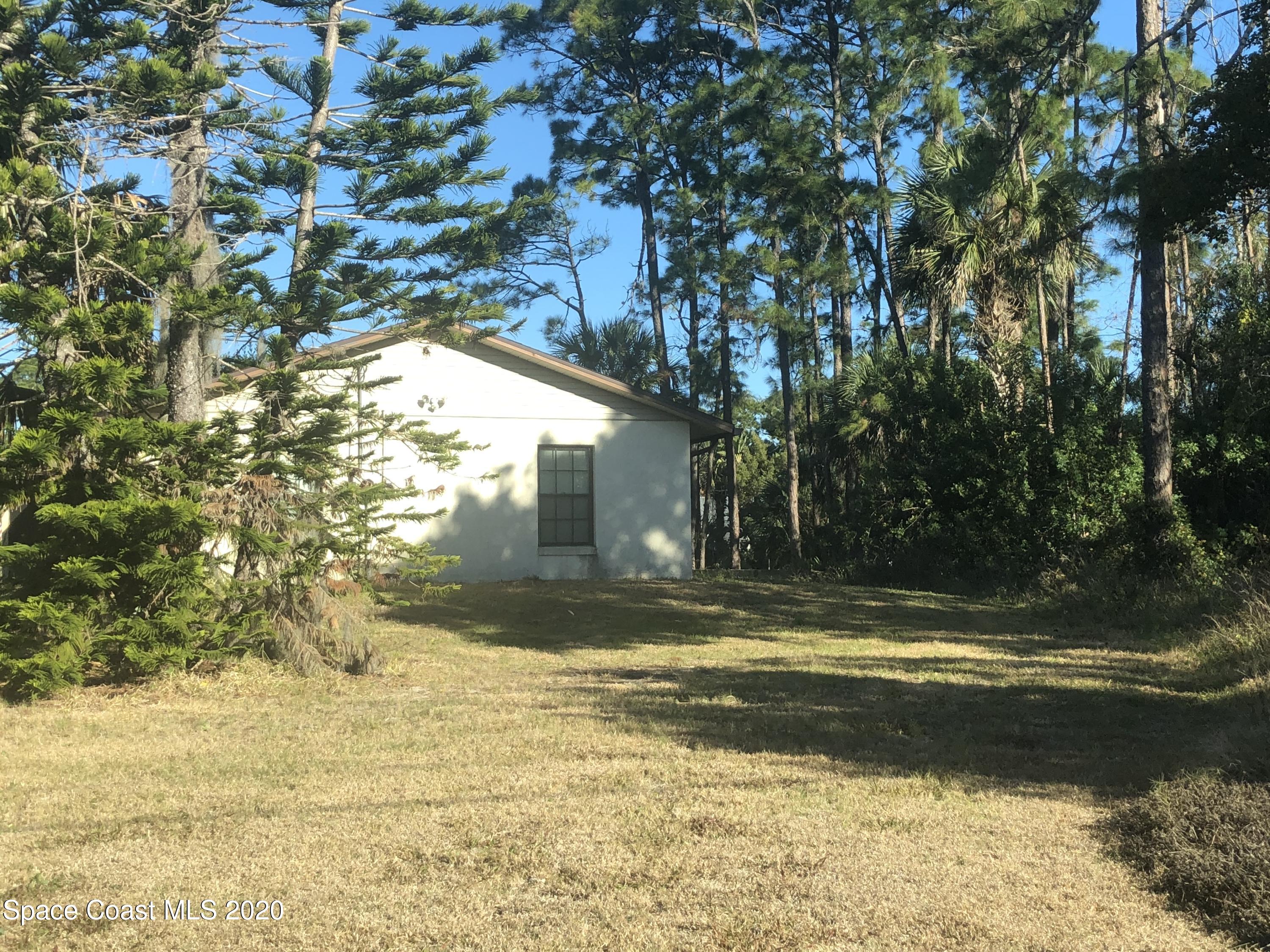 3627 Canal Road Edgewater, FL 32141 - Photo 3 of 33 3-Side 1