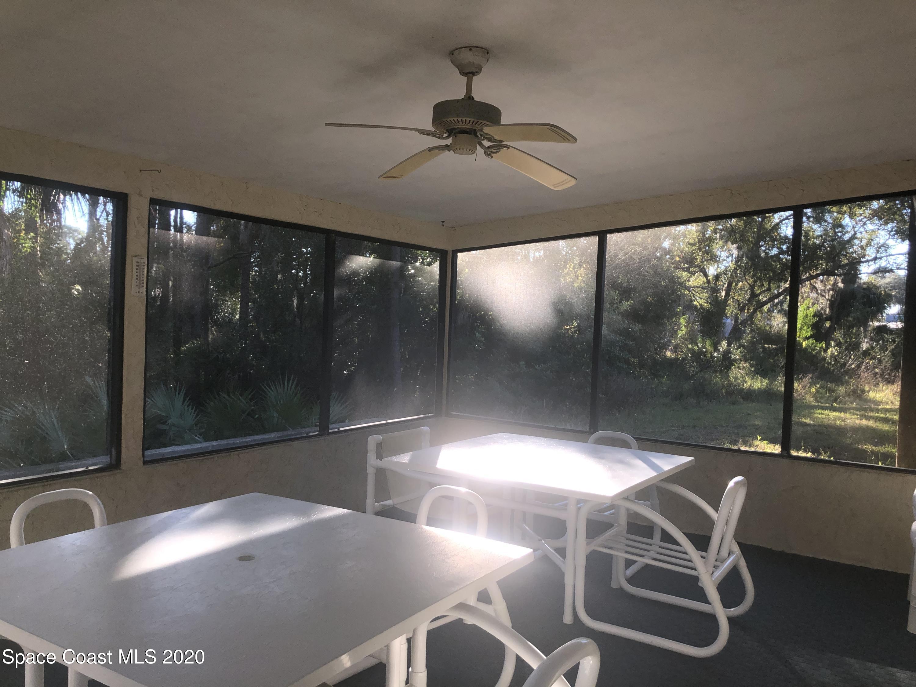 3627 Canal Road Edgewater, FL 32141 - Photo 29 of 33 back porch