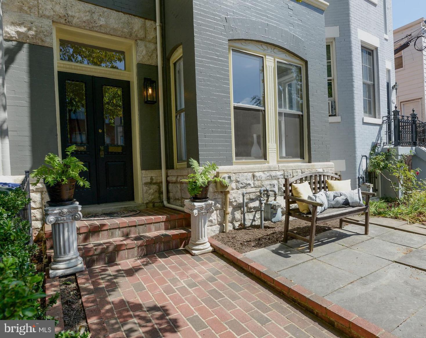 215 9th Street Northeast Washington, DC 20002 - Photo 2 of 26 Immaculate brick walkway and stone patio at entry