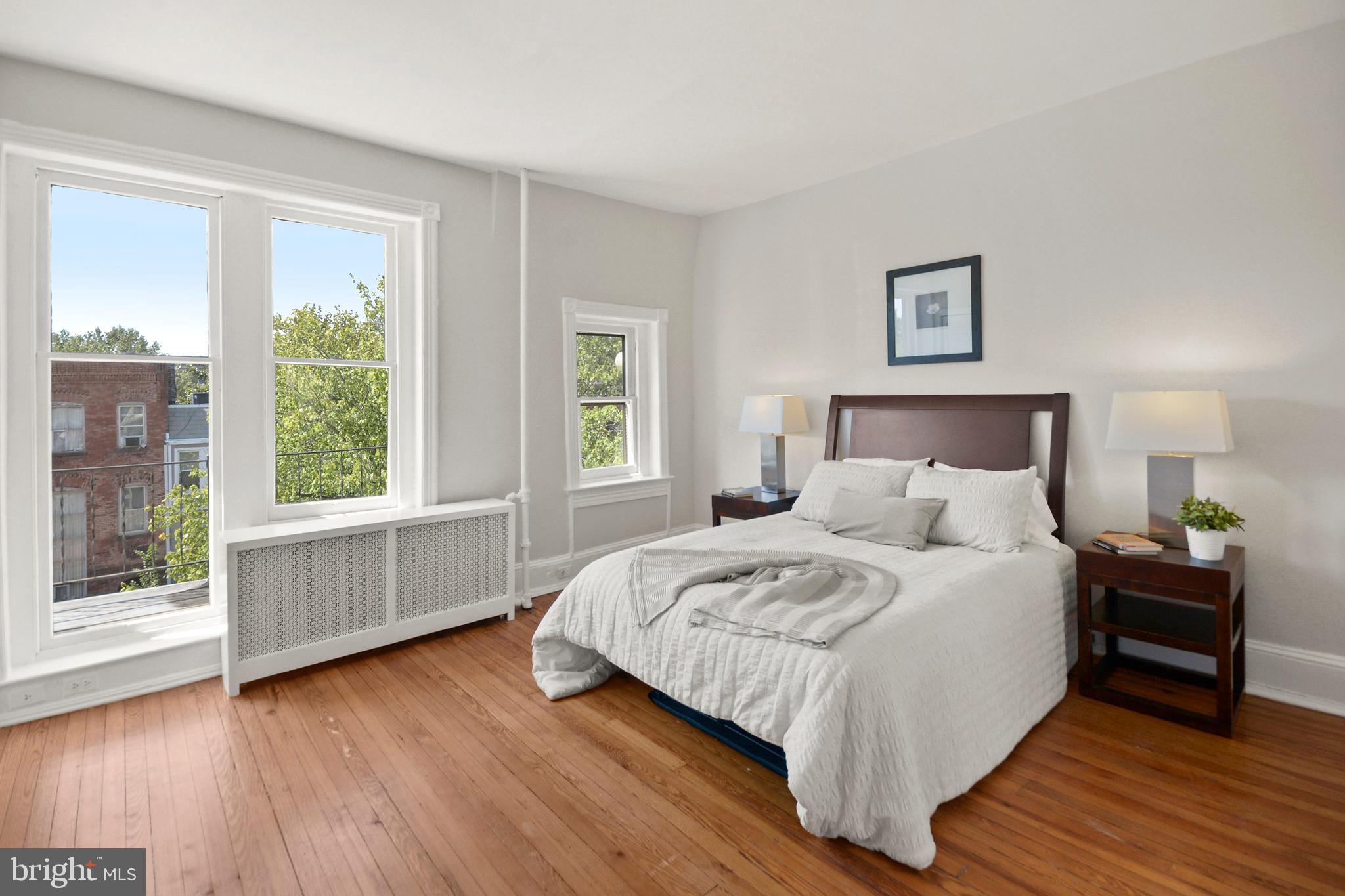 215 9th Street Northeast Washington, DC 20002 - Photo 20 of 26 Penthouse bedroom with sunset views