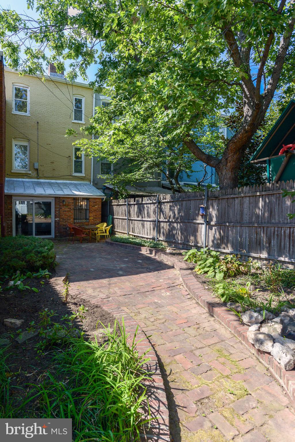 215 9th Street Northeast Washington, DC 20002 - Photo 24 of 26 Sculpted brick patio and gardens