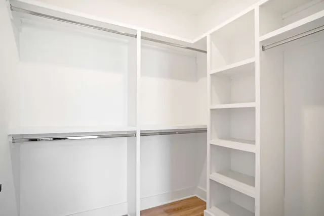 a view of an empty walk in closet