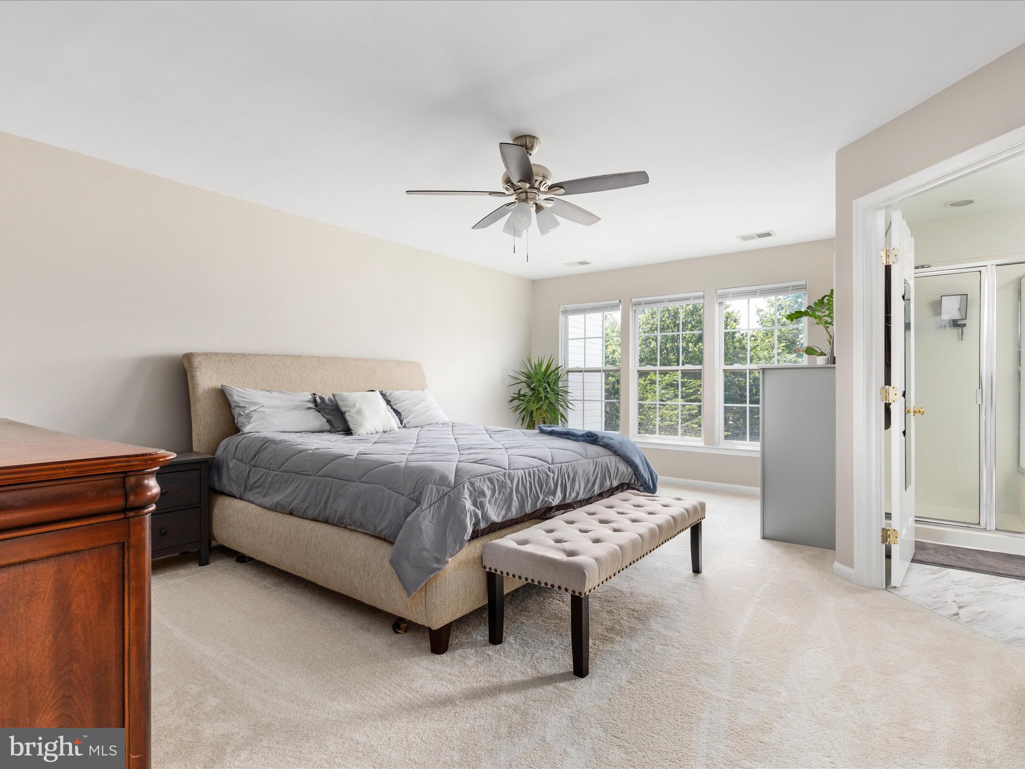 7100 Wheeling Way Gainesville, VA 20155 - Photo 21 of 39 a bedroom with a bed and a chandelier