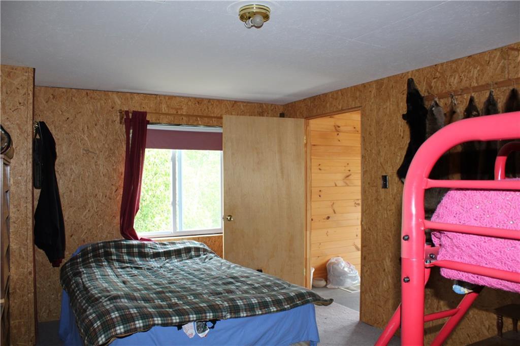 585 Old Spencer Road West Forks, ME 04985 - Photo 27 of 33 Another view of bedroom. Door leads...
