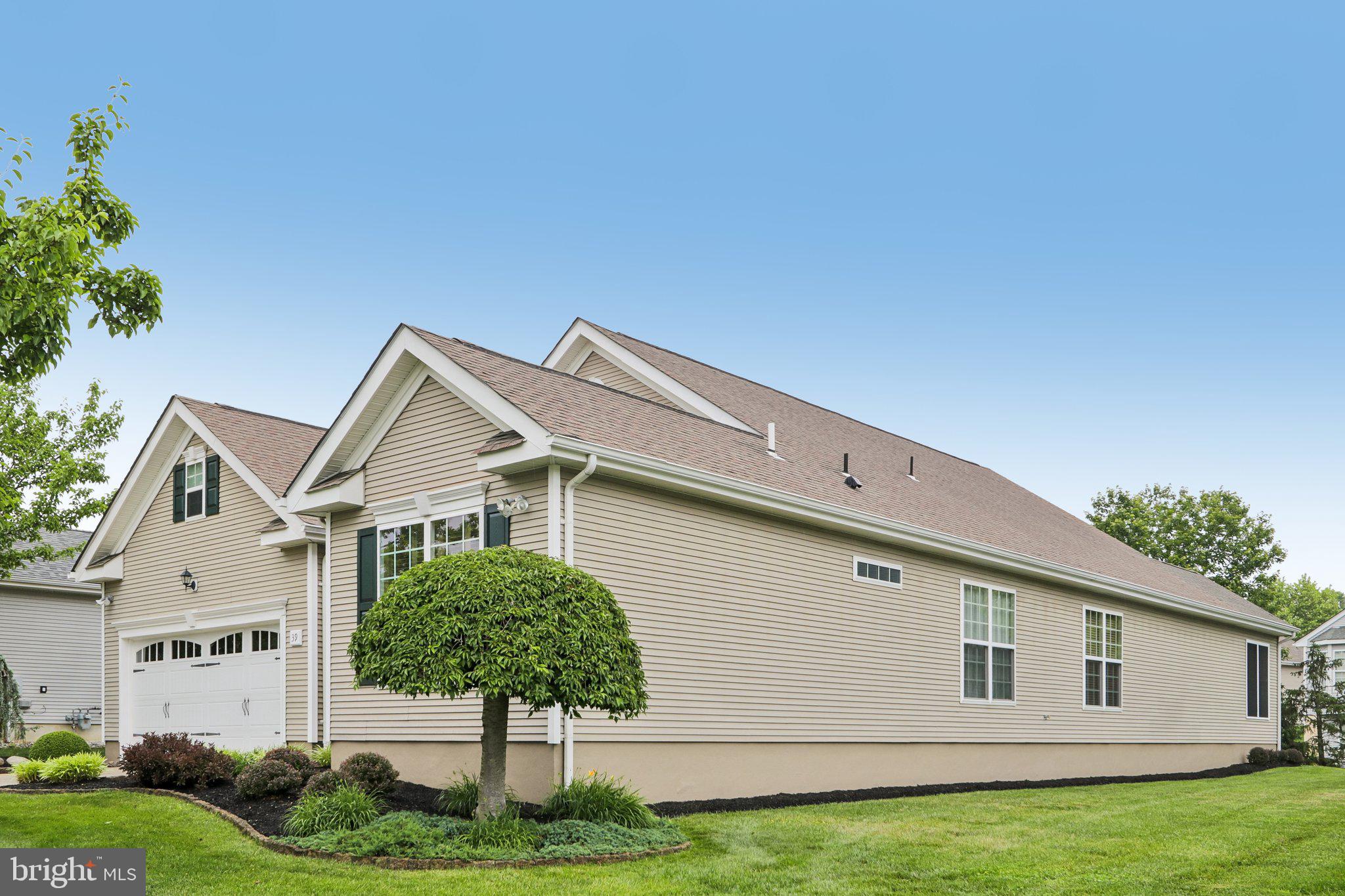 39 Danbury Road Swedesboro, NJ 08085 - Photo 43 of 62 a front view of a house with garden