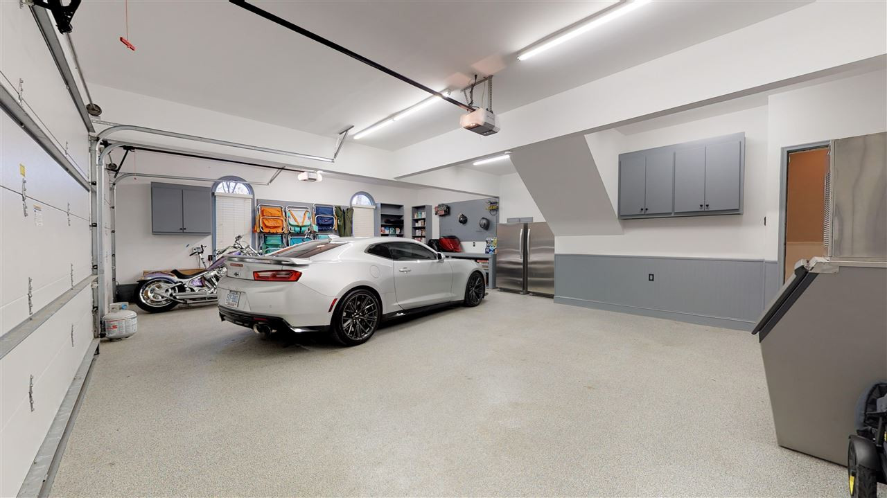 13609 Possum Track Road Raleigh, NC 27614 - Photo 27 of 30 Three car garage heated and cooled.
