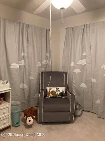 a bedroom with a bed and furniture