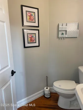 a bathroom with a toilet and a sink