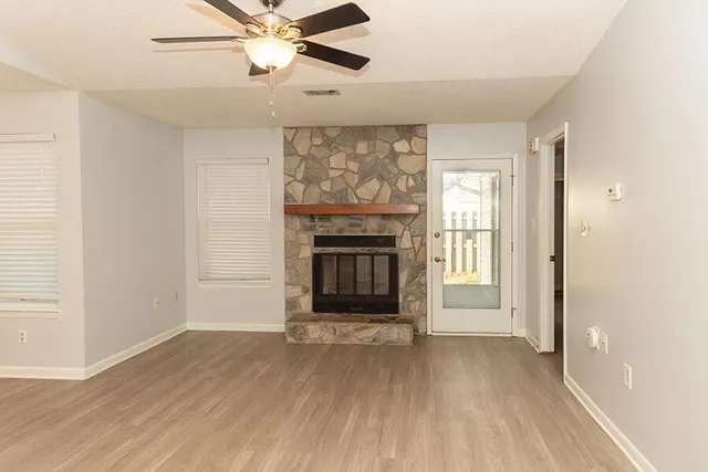 a kitchen with stainless steel appliances a refrigerator stove microwave and sink