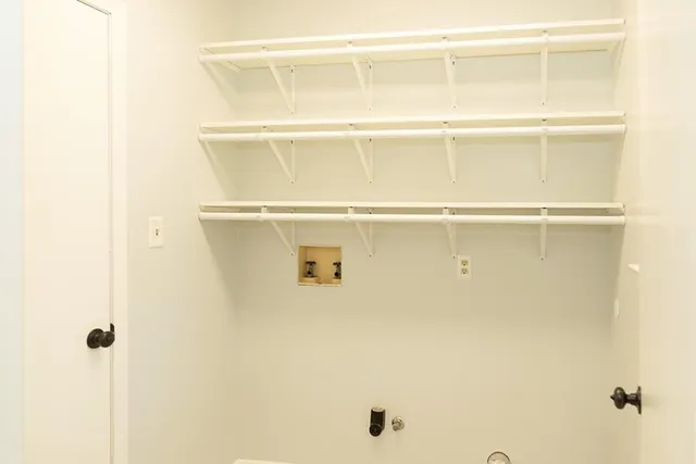 a view of a room that has a window in it