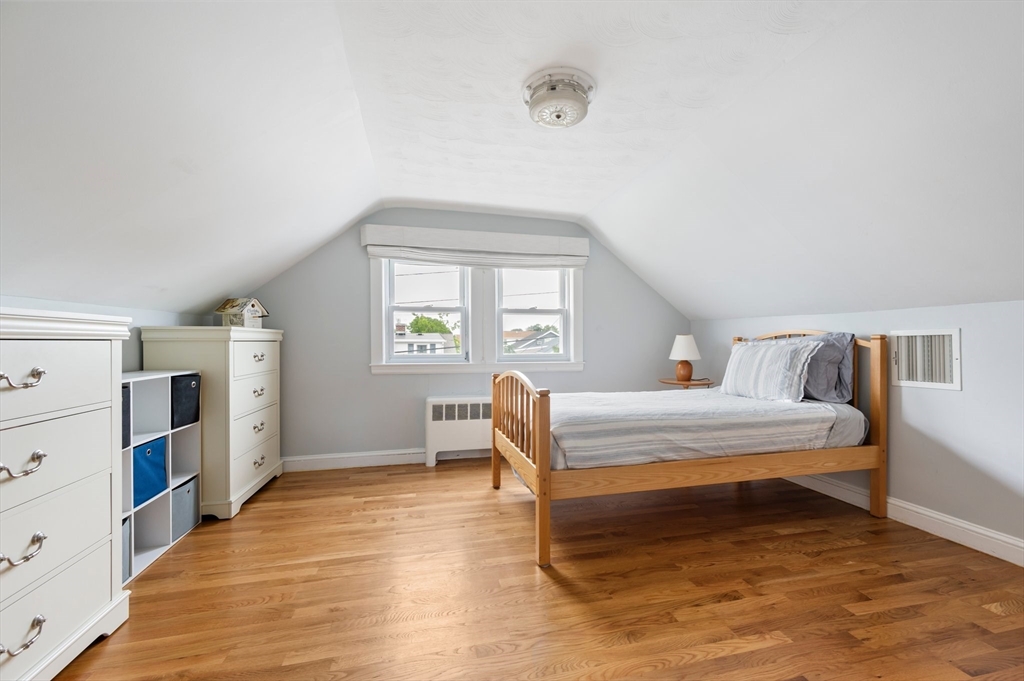 22 E Street Hull, MA 02045 - Photo 14 of 20 a bedroom with furniture and window