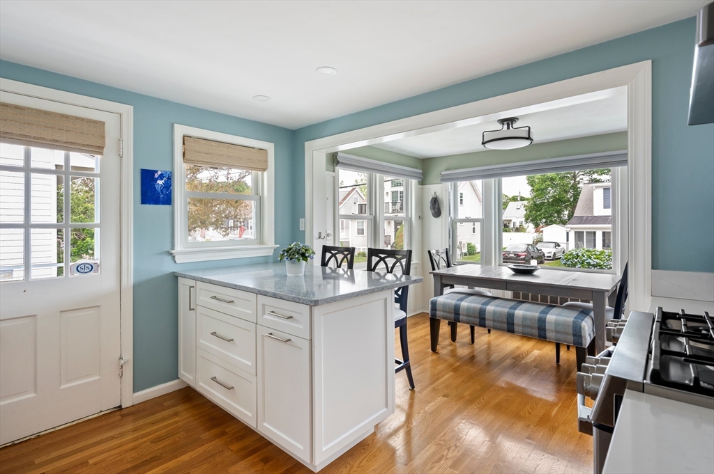 22 E Street Hull, MA 02045 - Photo 5 of 20 a living room with furniture and a large window