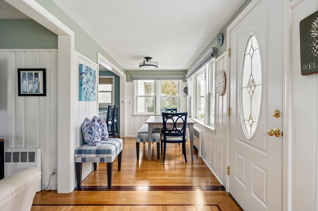 22 E Street Hull, MA 02045 - Photo 7 of 20 a view of a livingroom with furniture window and wooden floor